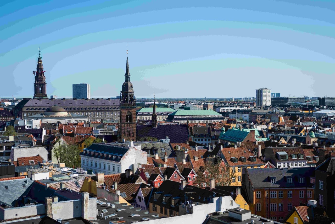 Cityscape of Copenhagen with spire of City Hall, Denmark